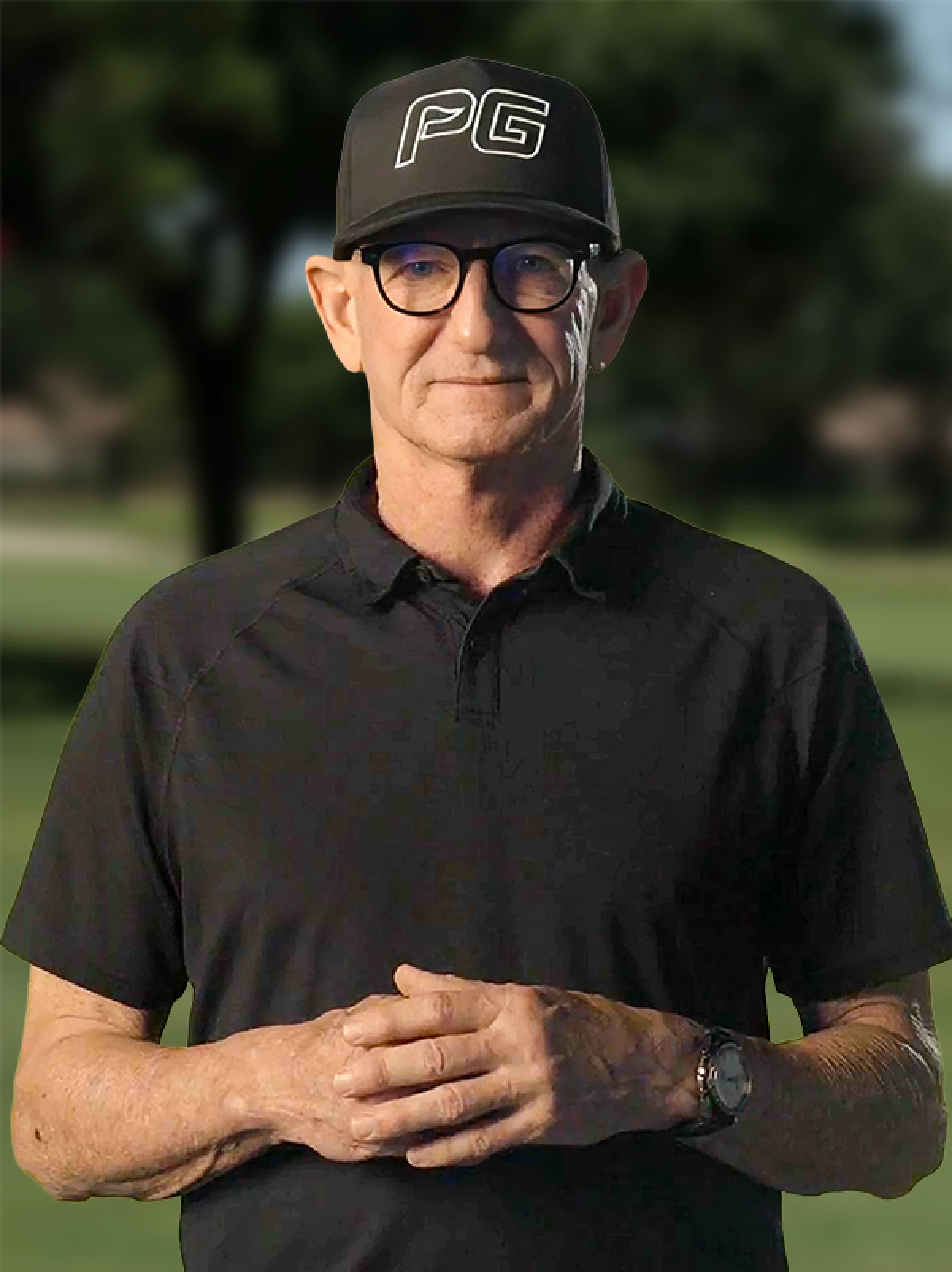 Hank Haney wearing a PG hat, Tiger’s former coach